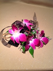 Orchid wristlett from Lewis Florist in Grayslake, IL 