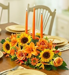 Peach and yellow centerpiece from Lewis Florist in Grayslake, IL 